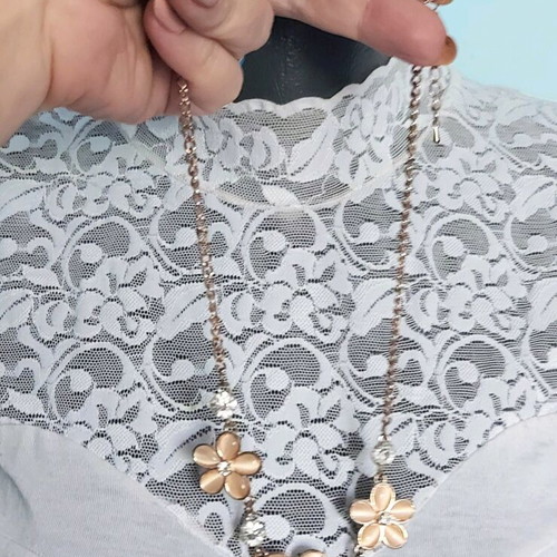 Choker necklaces like new with black ornaments, mother-of-pearl flowers and hearts