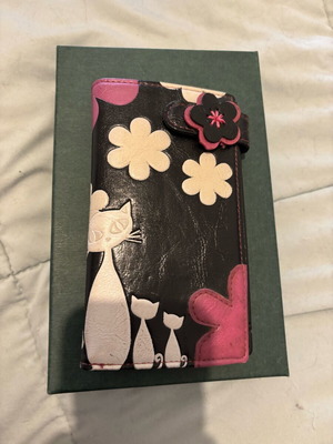 Doca wallet with cat and flower details, like new, black