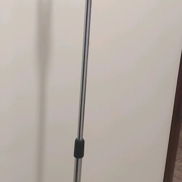 Professional microphone stand used with heavy steel base