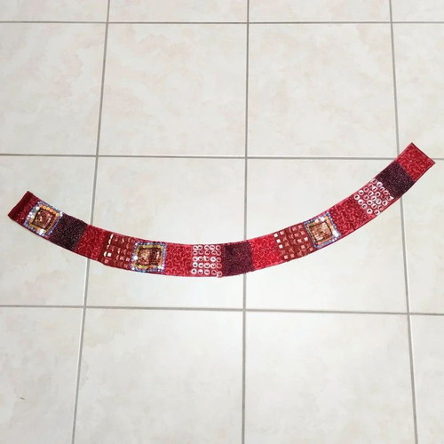 Embroidered handmade belt in burgundy red, adjustable with scratch