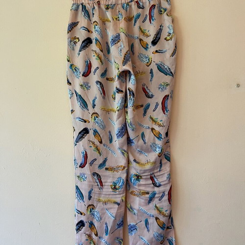 Satin pants like new, pink with feather pattern, sizes S/M