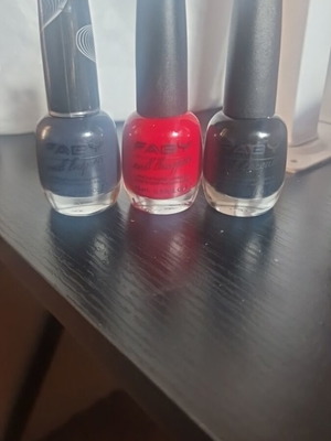 Faby nail polishes like new, grey red black set of three