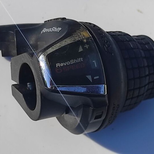 Shimano Tourney RevoShift 3x6 speeds used with grips