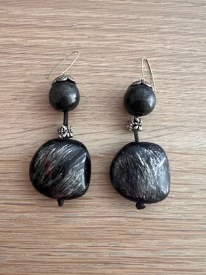 Women's hanging earrings used