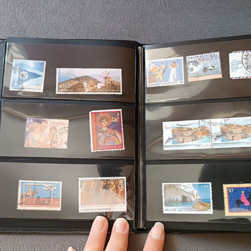 Stamp album with 120 stamps like new, Greece Australia Cyprus Germany America Canada
