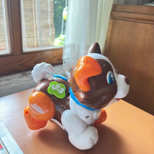 Colorful puppy toy on wheels designed by Clementini