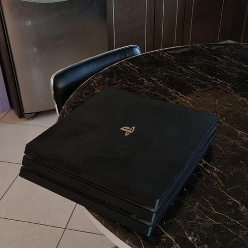 PS4 Pro 1TB console like new, cool running