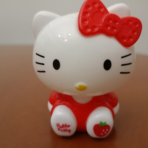 Hello Kitty figure with strawberry like new