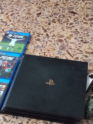 PS4 Pro console with 3 games and 2 controllers