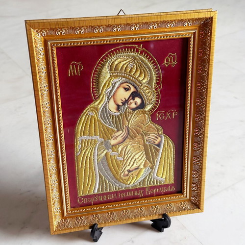 Russian embroidered icon like new, gold frame with glass