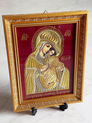 Russian embroidered icon like new, gold frame with glass