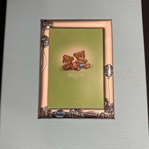 Photo album like new for newborns with silver-plated frame