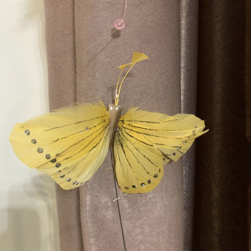 Decorative butterflies like new, yellow, pink, and sky blue for crafts