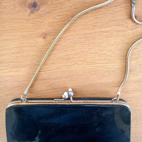 Vintage patent leather handbag used, black with pearl clasp