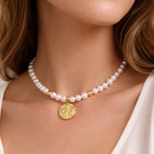 Necklace with cultured pearls and gold sun and moon element new