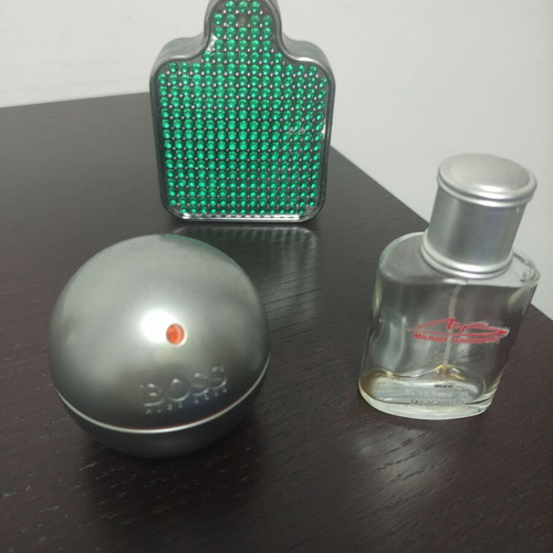 Empty Versace, Hugo Boss and Michael Schumacher perfume bottles used, collection pack