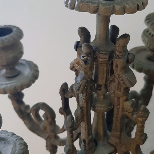 Bronze candlesticks used, pair with patina and carved base