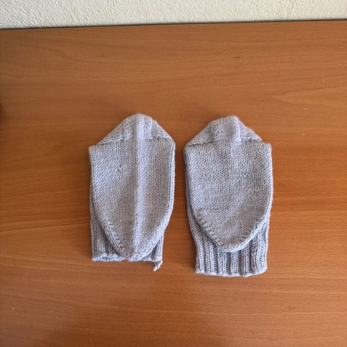 Handmade woolen socks in soft light blue color, new