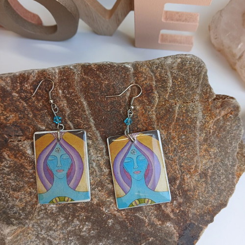 Handmade earrings with resin glass on aluminum base