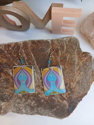 Handmade earrings with resin glass on aluminum base