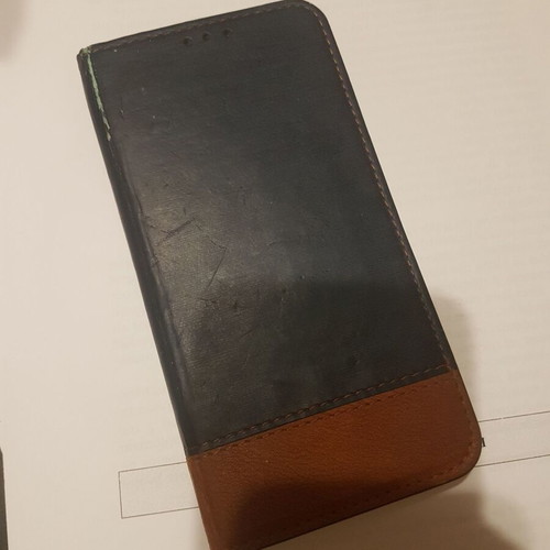 Xiaomi Redmi 4X smartphone with cracked screen, gold