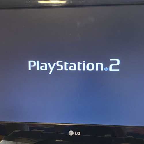 Sony PlayStation 2 console like new with 2 controllers, 2 memory cards, HDMI adapter, 4 games
