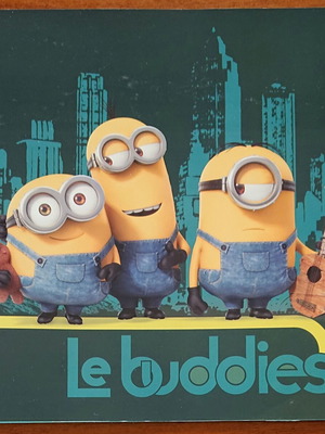 Minions sticker album used, half completed by GIM S.A.