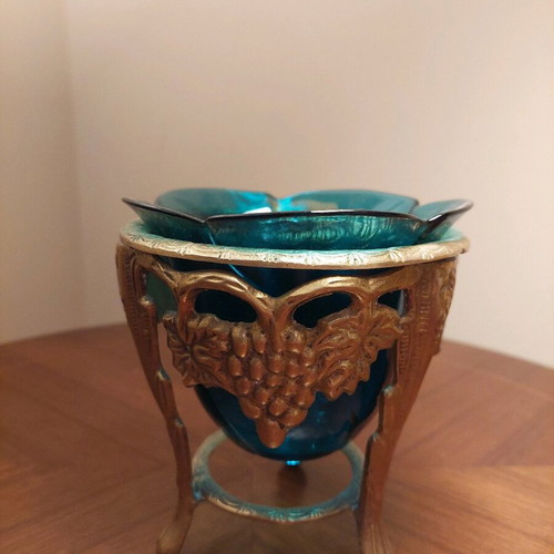 Vintage glass petrol planter with metal base like new