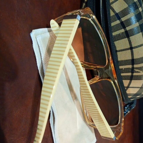 Men's sunglasses used, light brown tint with case and cleaning cloth
