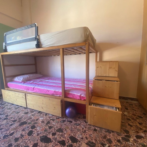 Kura bed used with convertible bunk and storage drawers