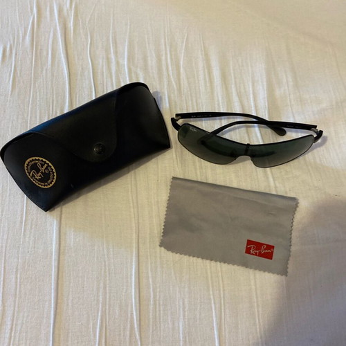 Rayban men's sunglasses used with small circular scratches
