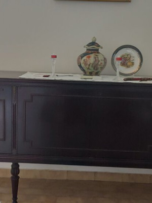 Antique living room sideboard with open doors