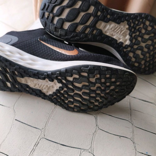 Nike shoes size 38.5 used, black with gold logo, athletic