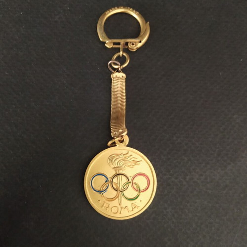 Olympic Games Rome 1960 Keychain like new, metal gold color