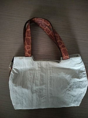 Bric's handbag used with fabric body and leather handles