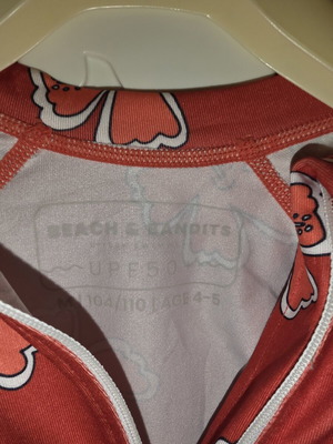 Beach & Bandits Girls' Swimsuit with Short Sleeves like new, size 104-110