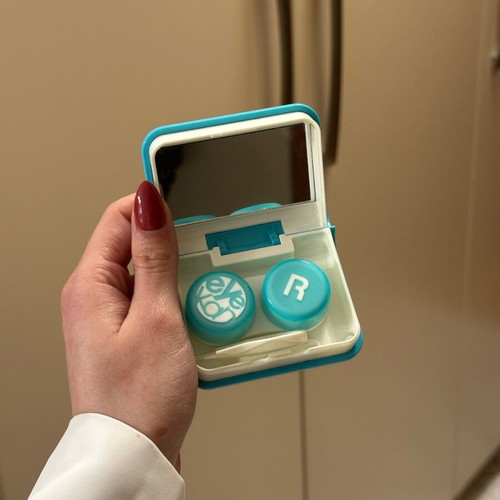 Contact lens case shaped like a book like new