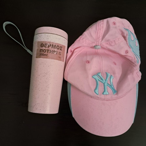 Hat pink with gift thermos used