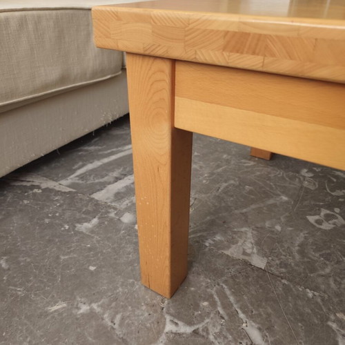 Wooden square coffee table used with minor surface wear