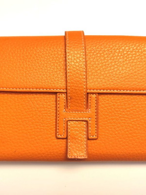 Leather wallet orange with white stitching like new