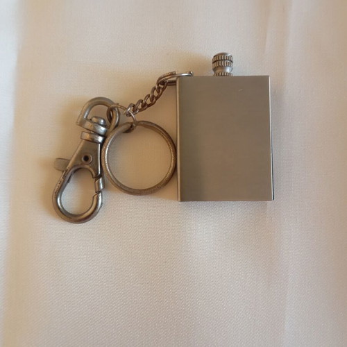 Vintage biker legend keychain lighter like new, nickel color