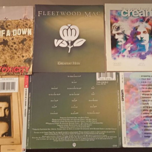 Booklets of System Of a Down Toxicity, Fleetwood Mac Greatest Hits, Cream The Very Best of used