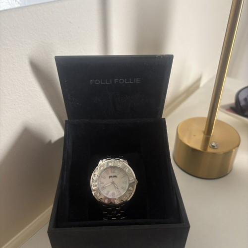Folli Follie wristwatch new, elegant and shiny