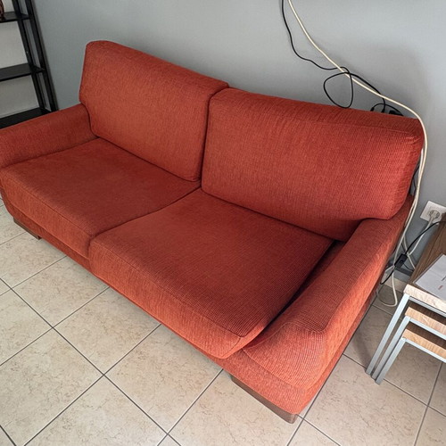 Orange sofa like new, comfortable and soft
