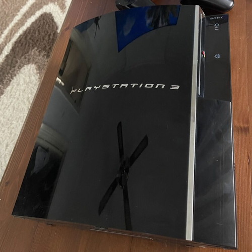 PlayStation 3 Backwards Compatible 60Gb like new with controller and cables