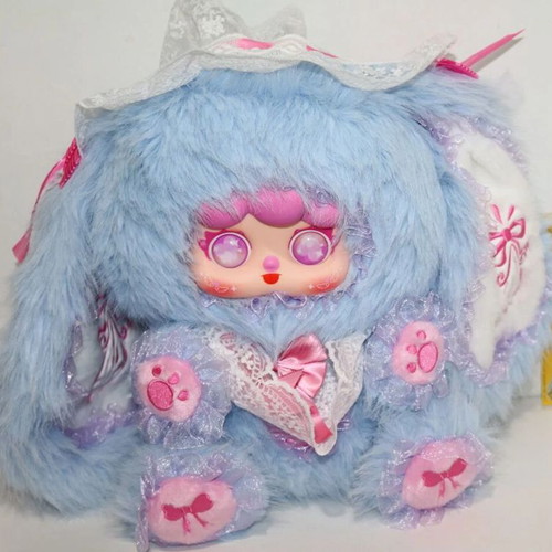 Stuffed baby doll dressed as rabbit like new