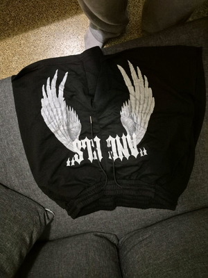 Black shorts with design used, size M