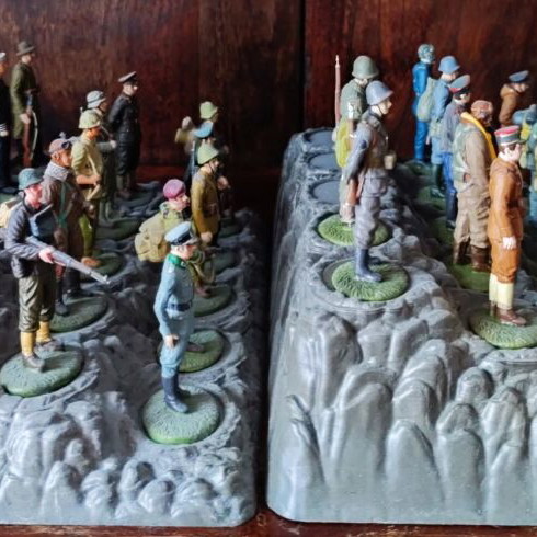 World War II Soldier Miniatures Collection like new, 37 pieces with stands and guide