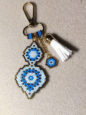 Blue and gold bag accessory keychain