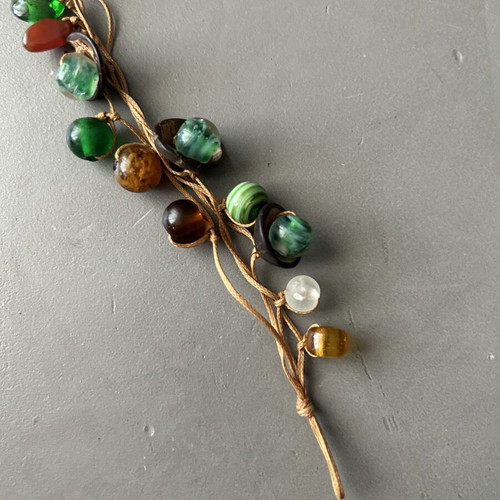 Handmade bracelet with colorful glass beads on cord like new